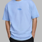 Light blue t-shirt with a logo on a plain background